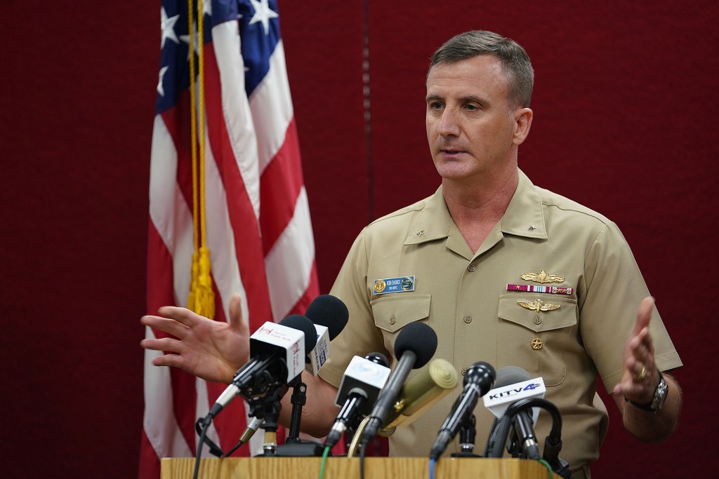 US Navy Rear Admiral Robert Chadwick speaks during Pearl Harbor shooting press conference.
