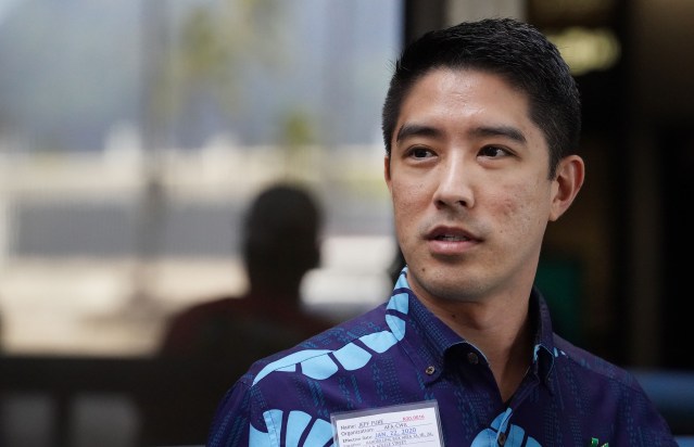Hawaiian Airlines Flight Attendant Jeff Fuke demonstrating at the Airport.