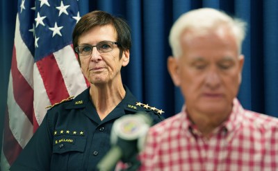 Honolulu Police Department Chief Susan Ballard listens as Mayor Caldwell speaks.