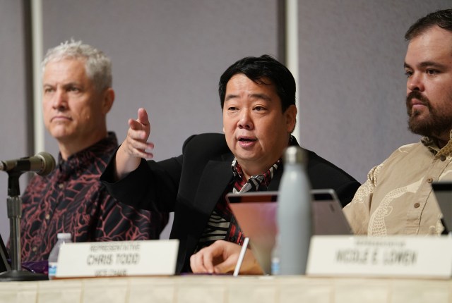 Chair Ryan Yamane, Water, Land and Hawaiian Affairs asks testifiers some questions during hearing.