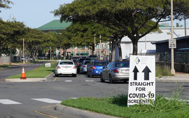 Scores of cars lined up on Ilalo Street near Kakaako Waterfront park for Coronavirus COVID19 screening.