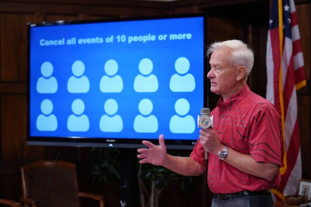 Mayor Kirk Caldwell puts on a short presentation on Coronavirus/ COVID19 and the need for people to not to gather more than 10 people. Caldwell later signed a proclamation closing bars, restaurants and nightclubs starting on march 20, 2020 at 830pm. Restaurants/bars are allowed to have takeout food and delivery