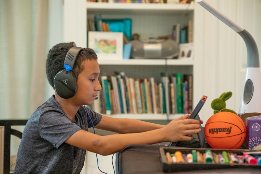 Brendan Punu, 5th grader at Punahou School, remote learning with his family in Makawao during the 2020 COVID-19 pandemic. Maui.