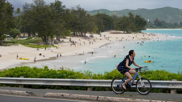Kailua Beach with cyclist headed towards Lanikai.