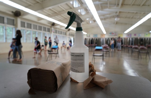 Paper towels and disinfectant inside the Kaneohe Elementary School cafeteria summer school opened during COVID-19 pandemic. June 12, 2020