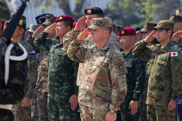 Col. John Lubas, commander of the 3rd Infantry Brigade Combat Team, 25th Infantry Division salutes while the U.S. and Royal Thailand National Anthems play, February 25, 2020, at Camp Akathotsarot in Phitsanulok Province, Thailand during the opening ceremony of Exercise Cobra Gold 2020. This is the 39th iteration of CG20, the largest joint-multinational military exercise in southeast Asia. The 10-day exercise is a series of training events that promotes and reinforces the enduring U.S./Thai alliance and demonstrates the U.S. military’s unwavering commitment to a free and open Indo-Pacific.