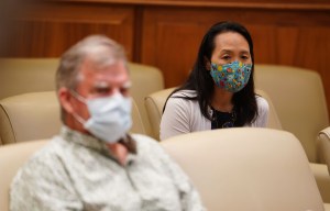 Department of Health Edpidemiologist Sarah Park sits socially distanced from DOH Director Dr. Bruce Anderson during COVID-19 press conference announcing a spike of 41 new cases. July 7, 2020