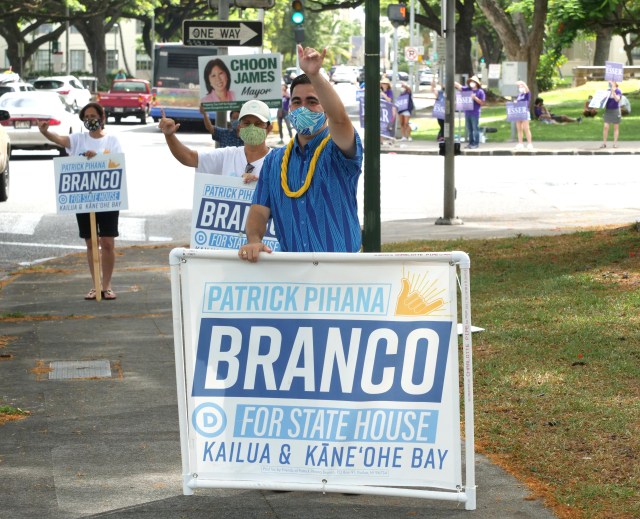 State House candidate for Kailua and Kaneohe Bay, Patrick Branco waves to cars on the corner of Beretania and Punchbowl in Honolulu, HI, Saturday, August 8, 2020. (Ronen Zilberman photo Civil Beat)