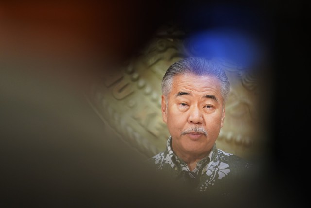Governor David Ige seen with video photographer in foreground, during press conference in the Ceremonial room. August 31, 2020