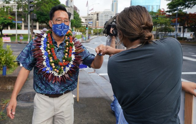 Honolulu Mayoral Candidate Keith Amemiya greets his supporters on the corner of Punchbowl and Beretania Street. August 8, 2020.