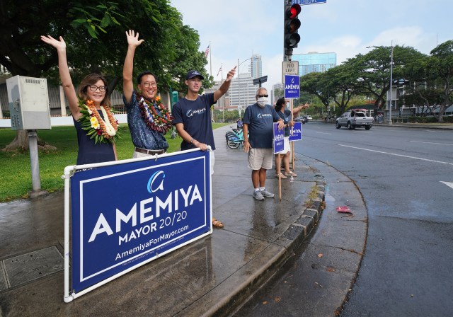 Honolulu Mayoral Candidate Keith Amemiya with left, wife Bonny Amemiya and son, Christopher Amemiya on the corner of Punchbowl and Beretania Street. August 8, 2020
