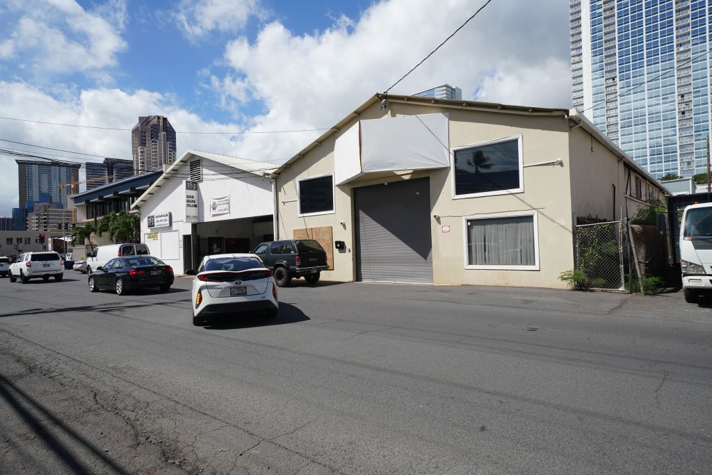 Kamaaina Termite and Pest Control building with obscured signs at 940 Queen street.
