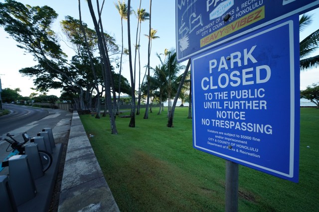 Mayor Caldwell ordered all parks and beaches closed. Sign at Leahi Park closed during COVID-19 pandemic.