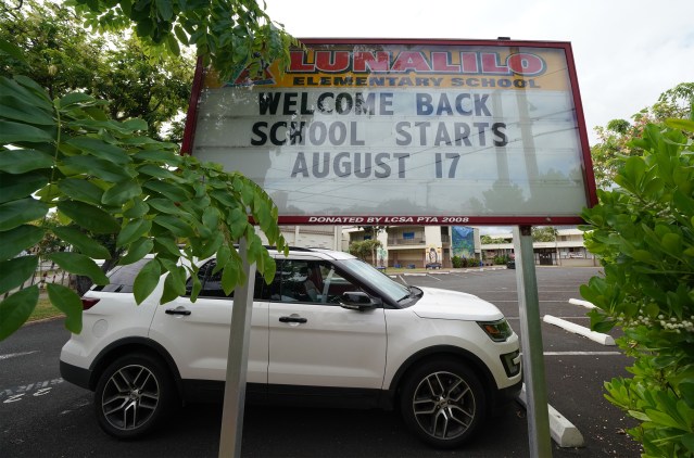 Lunalilo Elementary School sign on Fern Street, ‘Welcome Back School Starts August 17’ during COVID-19 pandemic. August 5, 2020