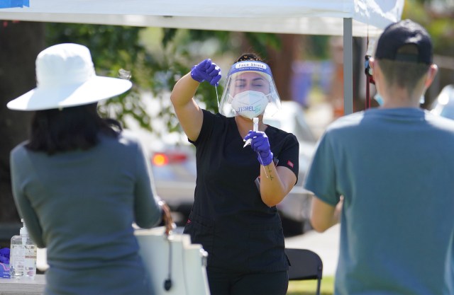 Medical personnel assist with surge COVID-19 testing at Waialae Iki Park. September 9, 2020