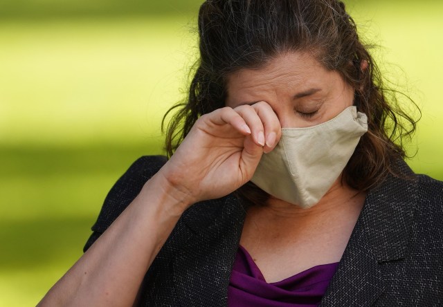 Department of Health Epidemiologist and whistleblower Jennifer Smith wipes away tears during press conference held with Tulsi Gabbard on August 14, 2020.