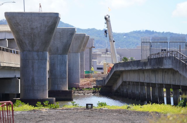 HART rail guideway columns near the Keehi Lagoon Beach pedestrian walkway as rail snakes towards Middle Street. September 17, 2020