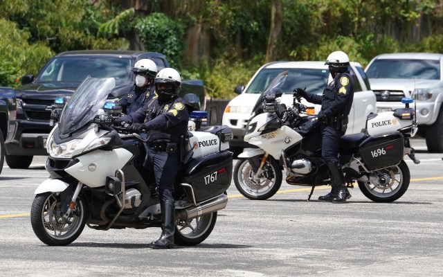 Honolulu Police Department solo bike officers outside the Kaneohe bound lanes of the H3 tunnels during COVID-19 H3 testing. Editors note, we were not allowed to photograph the actual testing, the state said we were a distraction.