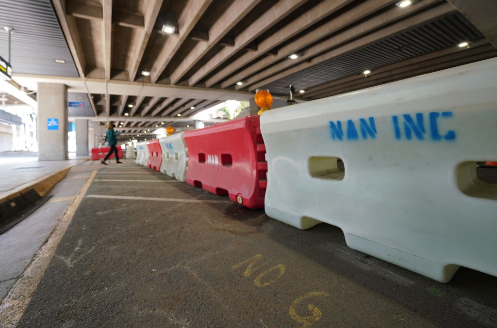 Nan Inc barriers at Daniel K. Inouye International Airport as construction hammers forward during COVID-19 pandemic. September 18, 2020