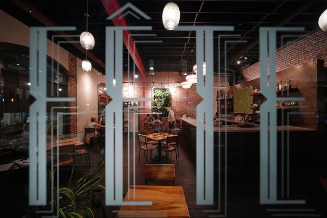 Customers sit at social distanced tables inside Fete Restaurant located in Chinatown during COVID-19 pandemic. October 26, 2020
