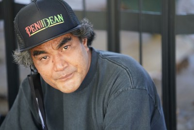 Jay Sohl sits in the shade along Kalakaua Avenue.