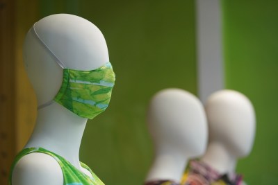 Mannequins in the window of Jams World sports a mask at Ala Moana Center during COVID-19 pandemic.
