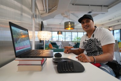 Kanu Hawaii Executive Director Keone Kealoha sits inside the Hub Coworking Hawaii space located in Kakaako.
