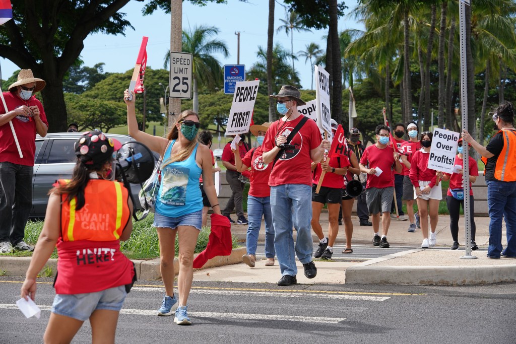 Local 5 supporters marched from Kakaako to the Federal Building.