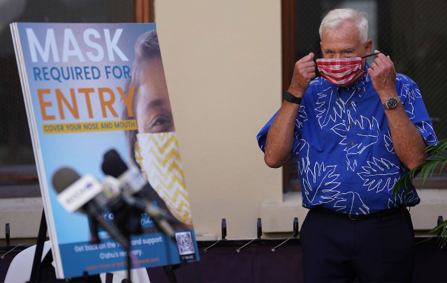 Mayor Kirk Caldwell masks up at press conference announcing the www.Backonthewave.com site and reopening bars safely during COVID-19 pandemic. Caldwell announced 125 positve COVID-19 cases today and urged the public to be vigilant. November 4, 2020