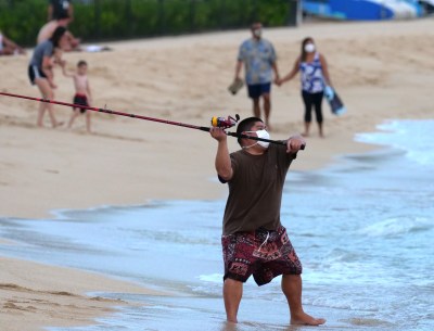 The Fish — And Fishermen — Are Back At Ala Moana Beach. Swimmers Are Not Happy