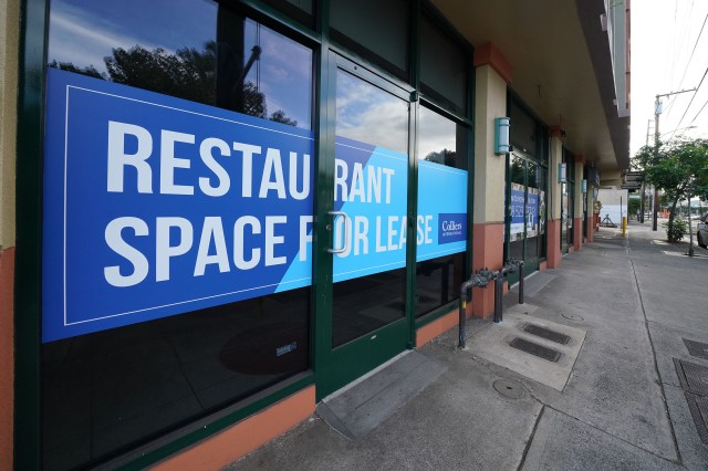 Restaurant Space for Lease sign at a commercial building located at the intersection of Isenberg/Beretania Street during the COVID-19 pandemic. December 8, 2020