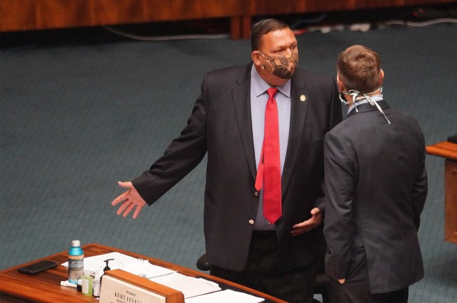 Senator Kurt Fevella speaks with Senator Gil Riviere before floor session begins at the Capitol during COVID-19 pandemic. July 6, 2020