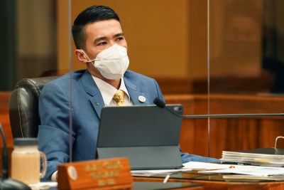 Honolulu City Council member Brandon Elefante listens to teleconferenced public testimony at a council meeting held at Honolulu Hale.