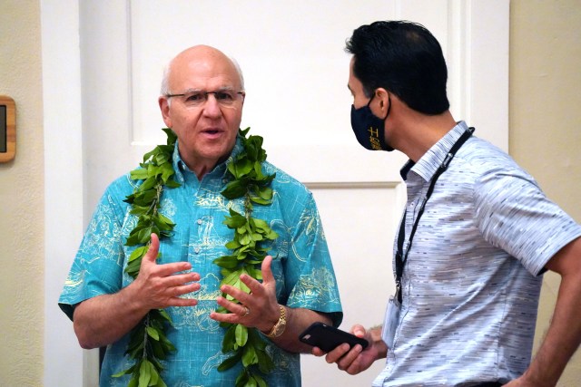 Honolulu Mayor Rick Blangiardi speaks with Communications Director Tim Sakahara before his first State of Honolulu speech.