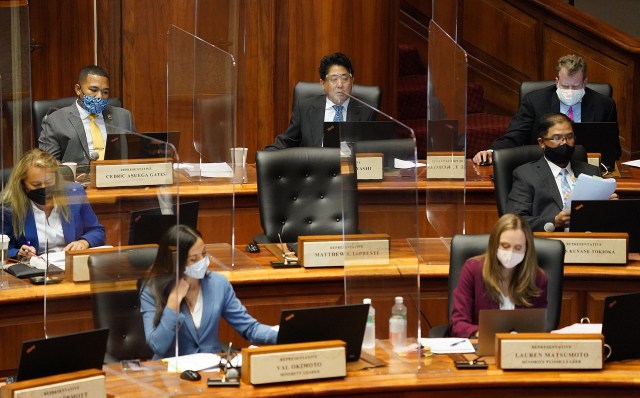 House members are separated by plexiglass dividers during COVID-19 pandemic. March 9, 2021.
