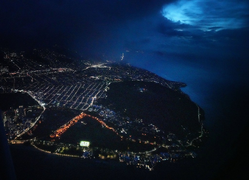 Kaimuki, Diamond Head and bottom left, Kapiolani Park in an early morning aerial photograph. March 5, 2021