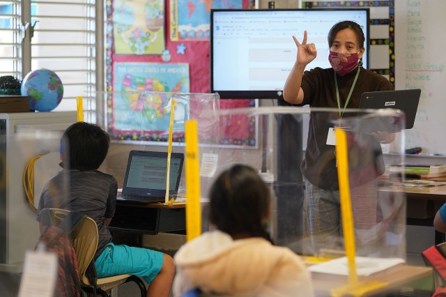 Lanai High and Elementary School. Elementary school teacher Ninez Abonal gestures during a lesson in class.