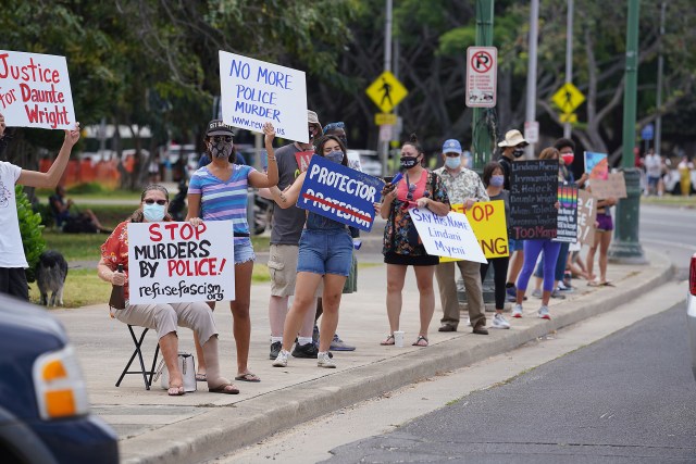 ‘Stop Murders by Police!’ demonstration at the intersection of Kapahulu Avenue and Kalakaua Avenue.