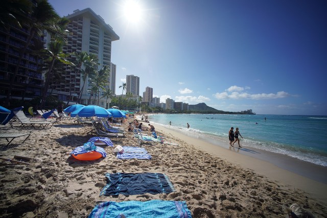 Waikiki Beach with more visitors arriving every day on Oahu during the COVID-19 pandemic.