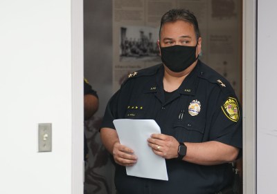 HPD Acting Police Chief Rade Vanic walks into room before press conference.
