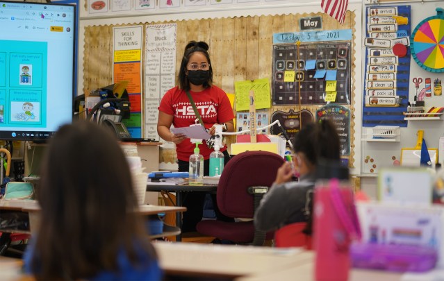 Honowai Elementary School Kindergarten teacher May Anne Kim teaches in her classroom.