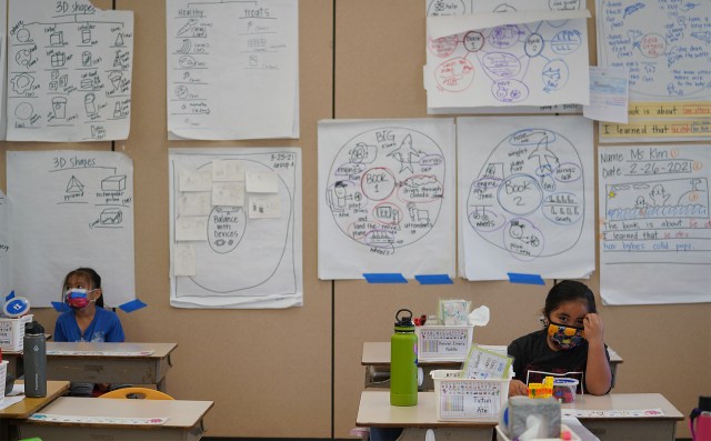 Honowai Elementary School Kindergarten teacher May Anne Kim’s classroom as she instructs students.