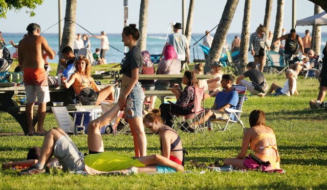 Crowds gather at San Souci State Recreational Park near Waikiki Beach on a sunday during COVID-19 pandemic. April 9, 2021