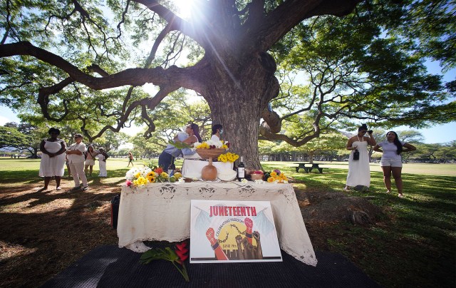 Juneteenth celebration held at Kapiolani Park with altar in center of the photograph.