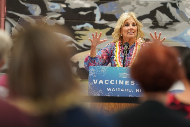 First Lady Dr. Jill Biden gestures while speaking at the Waipahu High School library on the importance of being COVID-19 vaccinated.