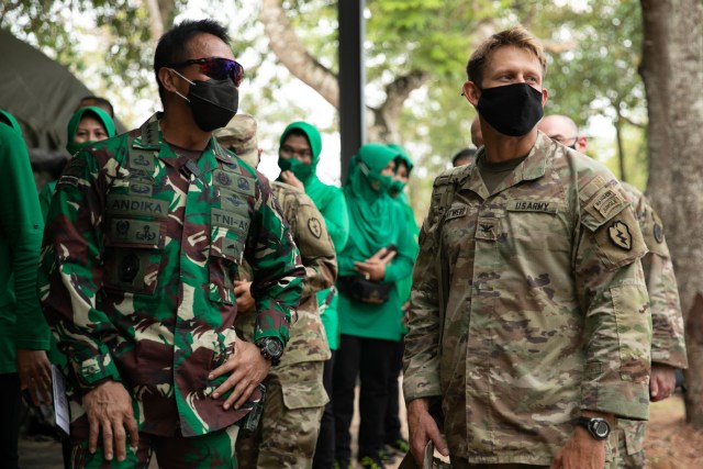 U.S. Army Col. Jeffrey VanAntwerp, 25th Infantry Division Deputy Commander of Operations, and Indonesian Gen. Andika Perkasa, Chief of Staff of the Indonesian Army, discuss upcoming plans during a visit to the Baturaja Training Area, Indonesia, on August 2, 2021. Garuda Shield 21 is a two-week joint-exercise between the United States Army and Tentara Nasional Indonesia (TNI-AD Indonesia Armed Forces) with the purpose of enhancing and enriching the jungle warfare ability of both the U.S. Army and Indonesian Army. (U.S. Army photo by Spc. Rachel Christensen)
