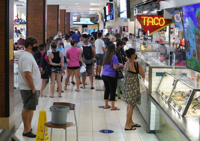 Looked like business as usual as crowds flocked to Ala Moana Shopping Center food court during a recent surge in Covid-19 cases. Statewide positive cases topped over 1000 today. August 27. 2021