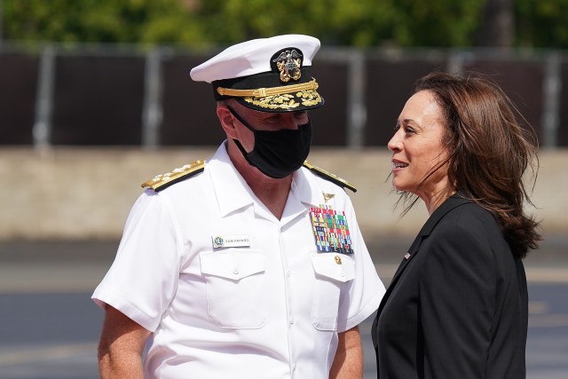 US Vice President Kamala Harris is greeted by Commander US Fleet, Admiral Samuel Paparo in Honolulu, Hawaii.