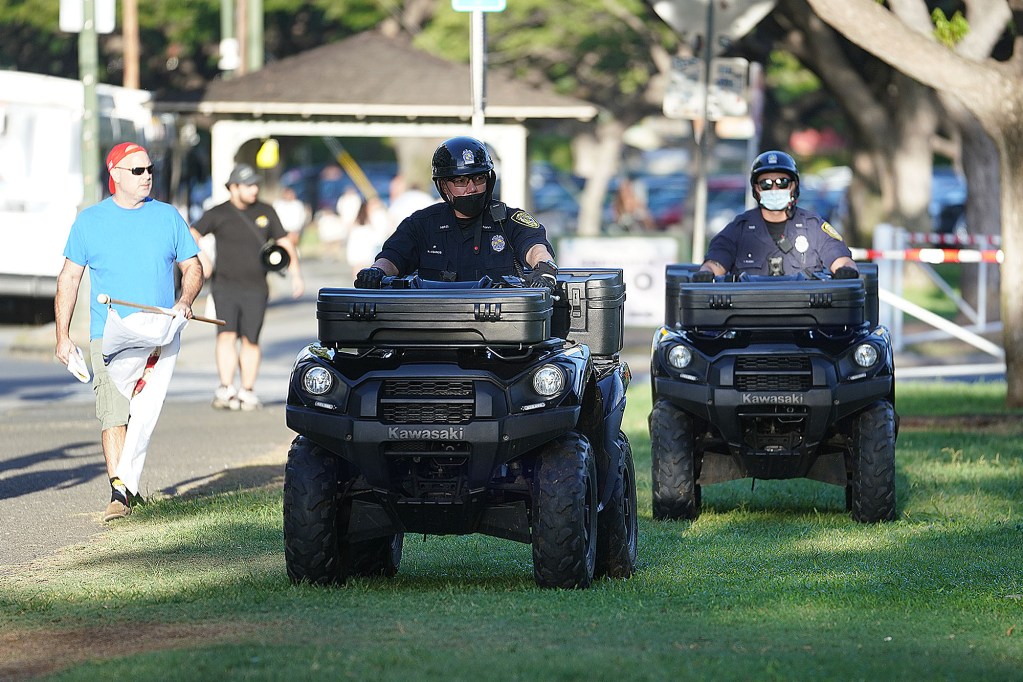 HPD police officers on ATV before the start of teh Aloha Freedom Coalition march from the Honolulu Zoo.