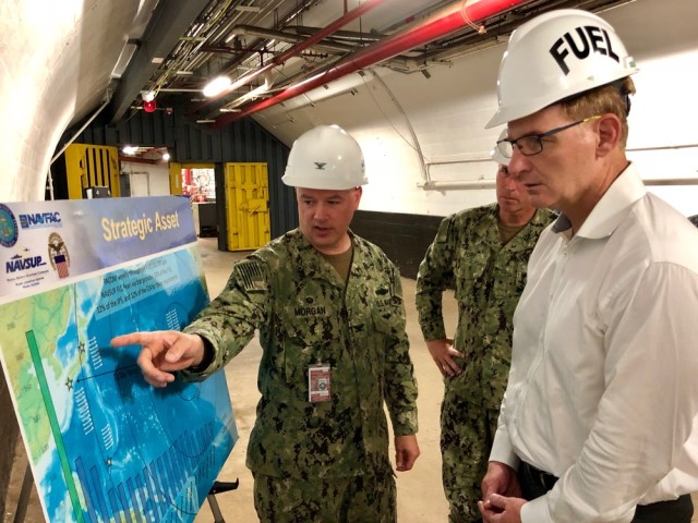 Capt. Eric Morgan, Commanding Officer of Naval Supply Systems Command (NAVSUP) Fleet Logistics Center (FLC) Pearl Harbor, briefed Under Secretary of the Navy Thomas Modly at the Red Hill Bulk Fuel Storage Facility during a September 2018 visit.